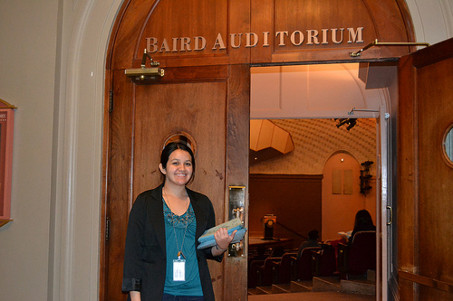 Intern Jasmine Fernandez at the Baird Auditorium, National Museum of Natural History.