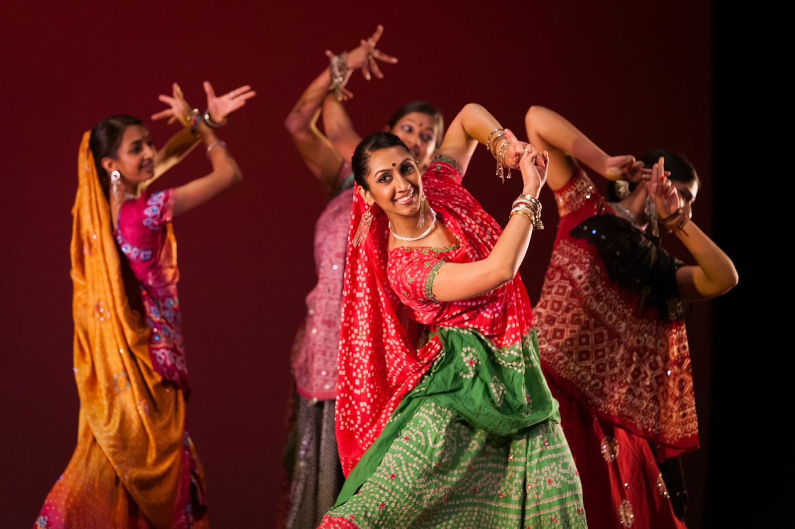 Bollywood Dancers.  Photograph by John Merrell