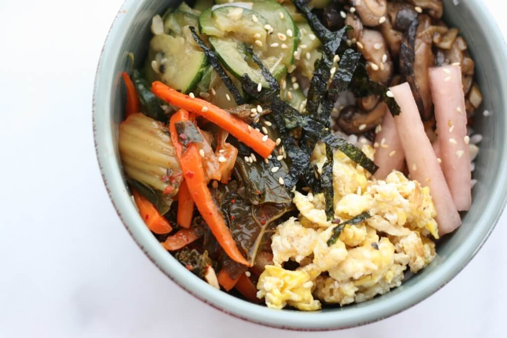 I made this rice bowl with leftovers plus whatever I had in my pantry--wild rice medley, kimchi, sauteed zucchini, daikon pickles, scrambled eggs and toasted nori. So delicious!