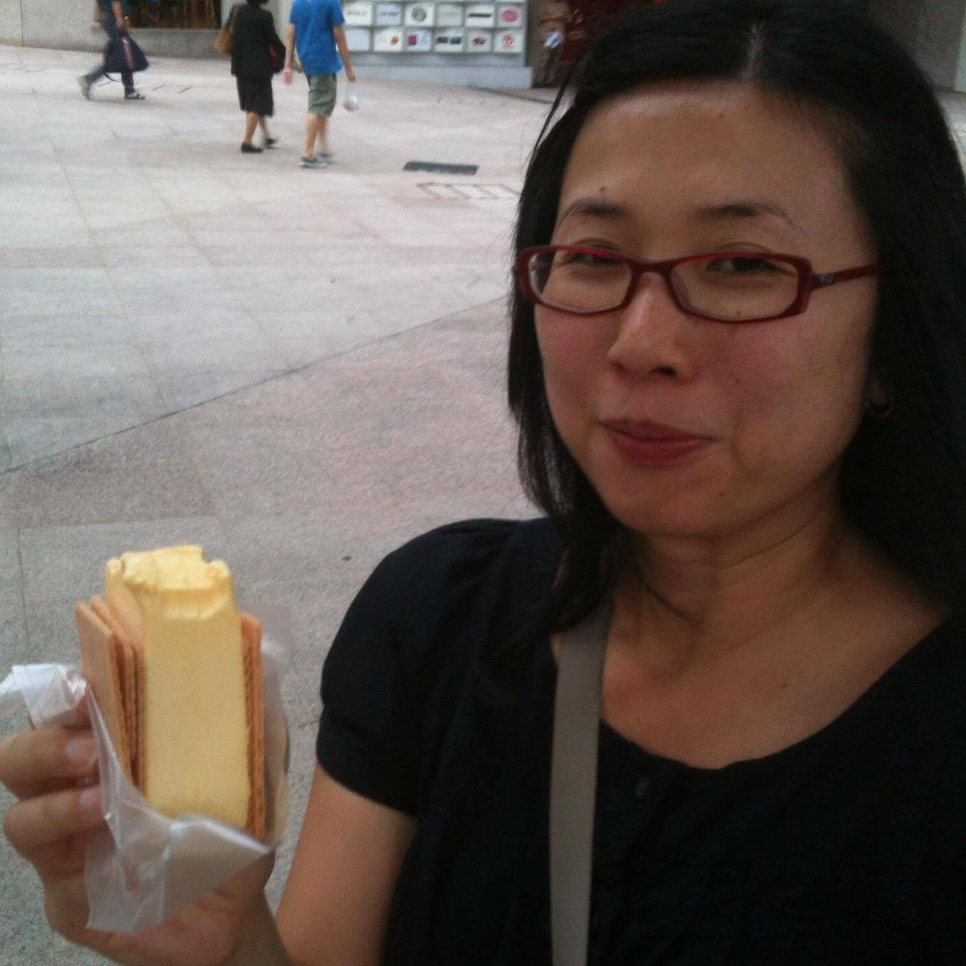 Girl eating ice cream sandwich