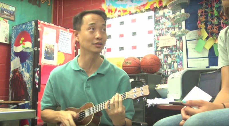 Music teacher plays ukelele